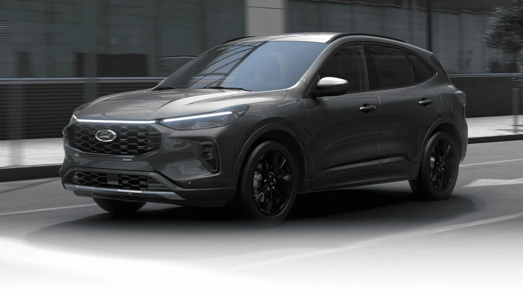 A stylish black 2025 Ford Escape ST-Line Hybrid driving through an urban cityscape, emphasizing its efficiency and sleek aesthetics.