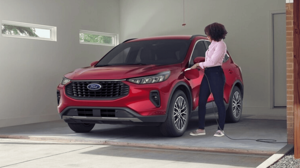 2025 Ford Escape® ST-Line Hybrid charging in a home garage in Shaker Heights, OH.