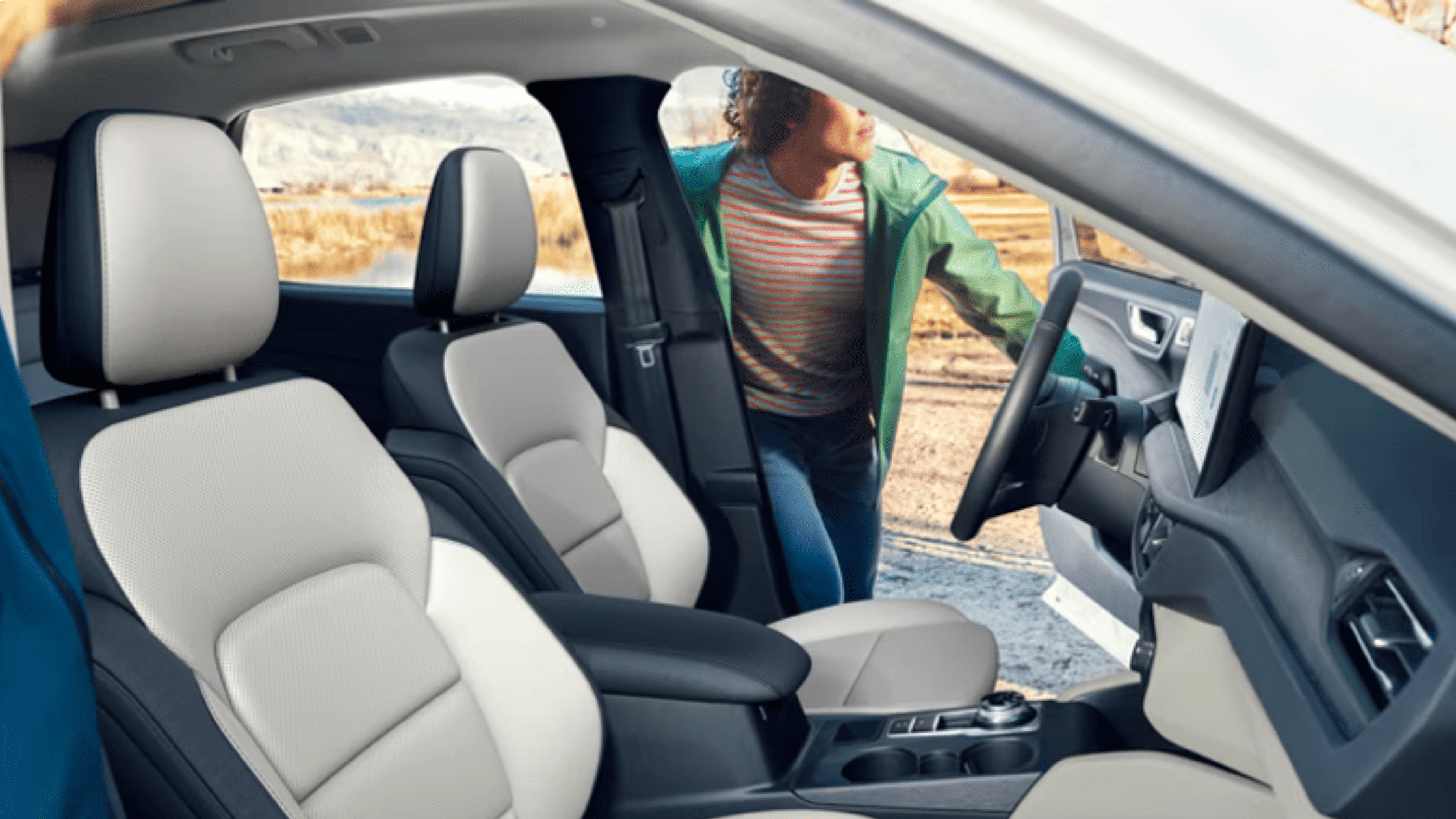 Front interior of a 2025 Escape® highlighting its clean dash layout with a large central infotainment screen near Concord, OH.