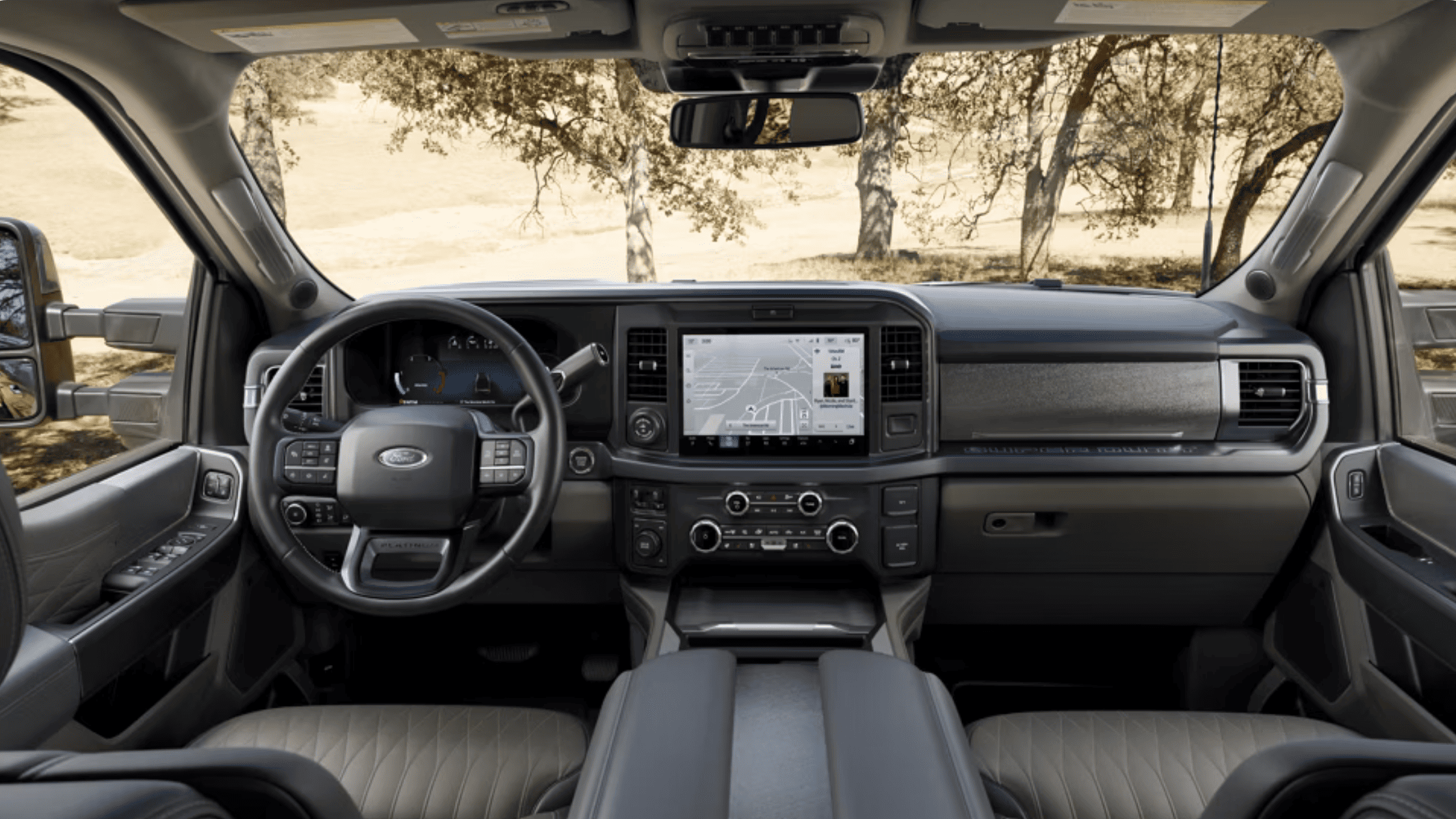 Interior of the 2025 Ford Super Duty® featuring an advanced infotainment system and productivity-focused dashboard layout.